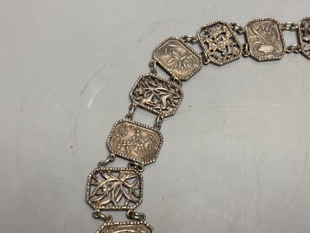 An early 20th century Chinese Export white metal belt by Wang Hing, Hong Kong and other items.
